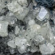 Topaz with Chlorite, Muscovite, Pyrite, Fluorapatite and Siderite