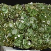 Tsavorite on Graphite