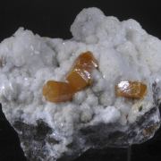 Wulfenite on Gypsum and Calcite