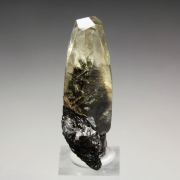 CALCITE with bitumen inclusions