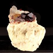 Spessartine Garnet, Orthose, Quartz.