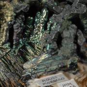 Psilomelane - iridescent, on Barite