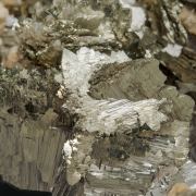 Arsenopyrite-Marcasite with Siderite and Muscovite