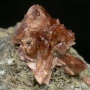 Helvine-Genthelvite with Calcite and Magnetite