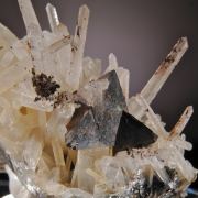 Helvite (unusually sharp crystals) on Quartz. Ex George Loud