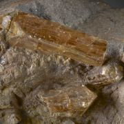 Topaz (Imperial) on matrix, rare red fluorescent