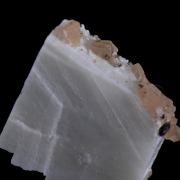 Serandite on Albite