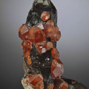 Spessartine on Smoky Quartz