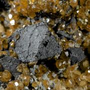 Spessartine with Helvite crystals