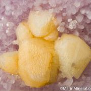 Calcite on Amethyst