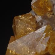 Barite (gemmy golden) on Quartz w. Fluorite