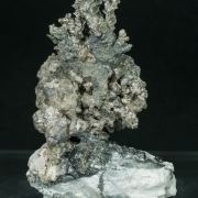 Allargentum after Dyscrasite with Sphalerite, Pyrargyrite and Schachnerite on Calcite