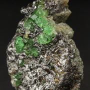 Tsavorite on Graphite