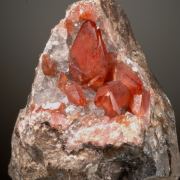 Rhodochrosite -Scalenohedral crystals on Quartz