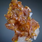 Orpiment -gemmy crystals on Calcite