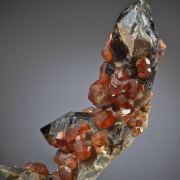 Spessartine on Smoky Quartz
