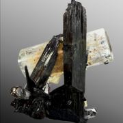 Beryl var. goshenite, tourmaline