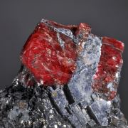 Rhodonite (doubly terminated crystal included by Galena)