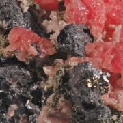 Rhodochrosite on Acanthite with Native Silver, Galena etc.