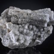 Calcite over/replacing Aragonite