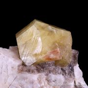 Londonite on Feldspar