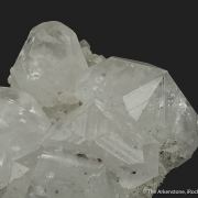 Calcite (fluorescent) on Quartz
