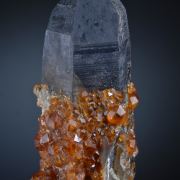 Spessartine on Smoky Quartz