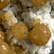 Stellerite balls on Albite
