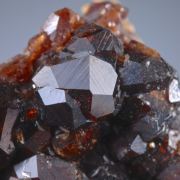 Spessartine with minor Hyalite Opal