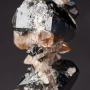 Topaz on Bixbyite