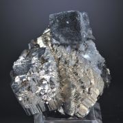 Bismuthinite inside Fluorite on Arsenopyrite