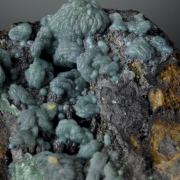 Chrysocolla after Malachite after Azurite with Wulfenite, Goethite.