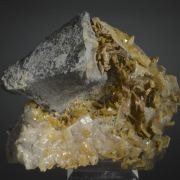 Wulfenite (fluorescent) with Galena, Calcite etc.