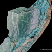 Calcite included by Malachite on Plancheite