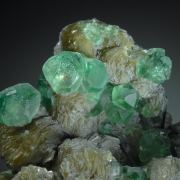 Fluorite on Muscovite, Schorl and Quartz etc.