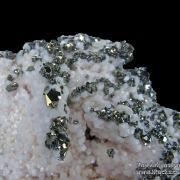 Manganoan Calcite (fl) on Tennantite and Sphalerite, with Pyrite