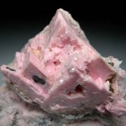 Rhodochrosite after Calcite