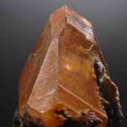 Calcite included by Realgar