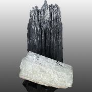 Beryl var. goshenite, tourmaline