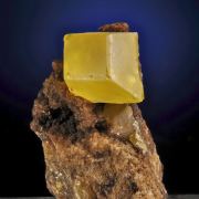 Sulphur (native crystallized with petroleum inclusions)