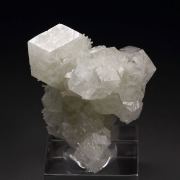 colorless GARNET var. GROSSULAR, DIOPSIDE floater