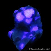 Rhodochrosite and Fluorite on Quartz