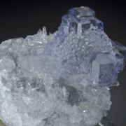 Fluorite - stepped cubo-octahedral on Quartz