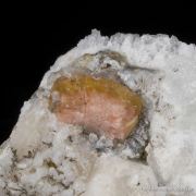 Fresnoite on Analcime