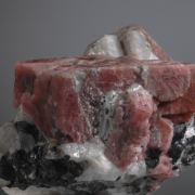 Rhodonite on Calcite with Franklinite
