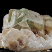 Fluorite - zoned crystals on Quartz