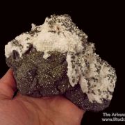 Manganoan Calcite (fl) on Tennantite and Sphalerite, with Pyrite