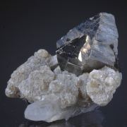 Arsenopyrite (twin) on Muscovite and Quartz