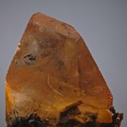 Calcite included by Realgar