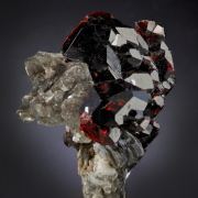 Spessartine on Muscovite